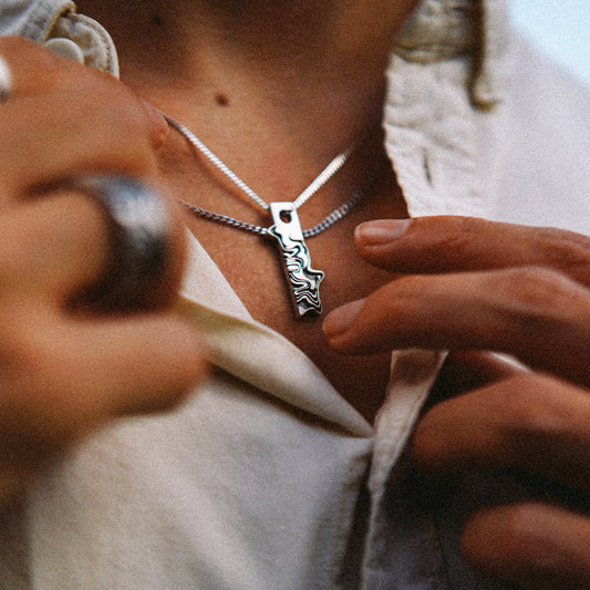 Solaque Tidal Motion handmade sterling silver pendant jewellery wearing around neck