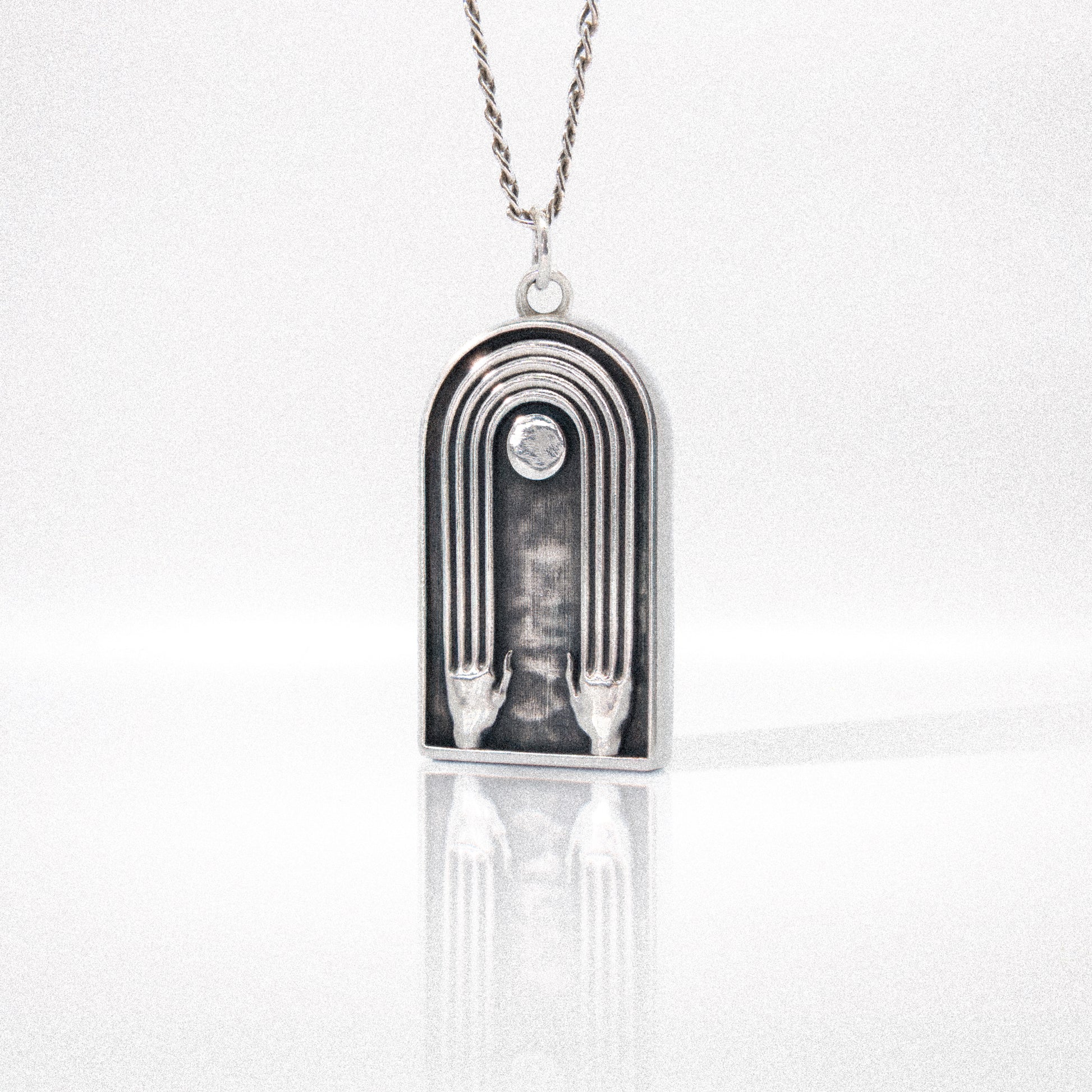 Solaque Crescent Hold handmade sterling silver Pendant jewellery against white background