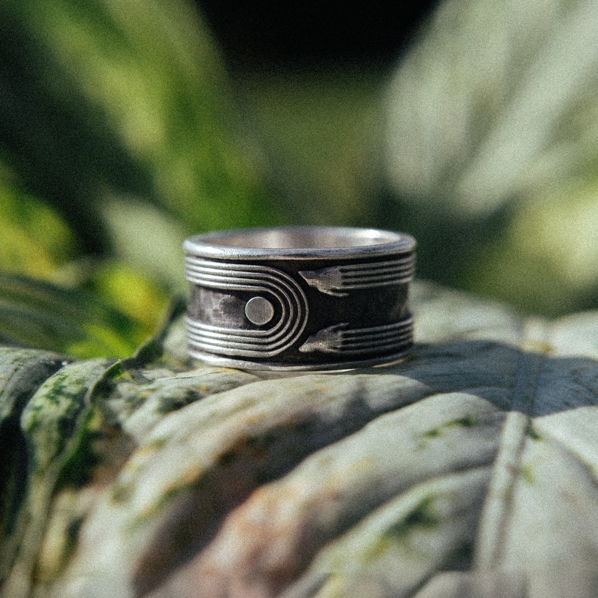 Solaque Crescent Hold handmade sterling silver ring jewellery on leaf