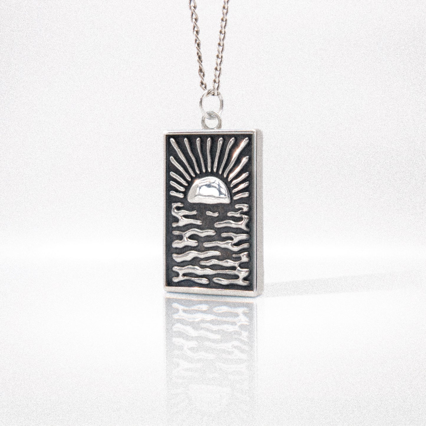 Solaque Echoes of Dusk handmade sterling silver pendant jewellery on white background