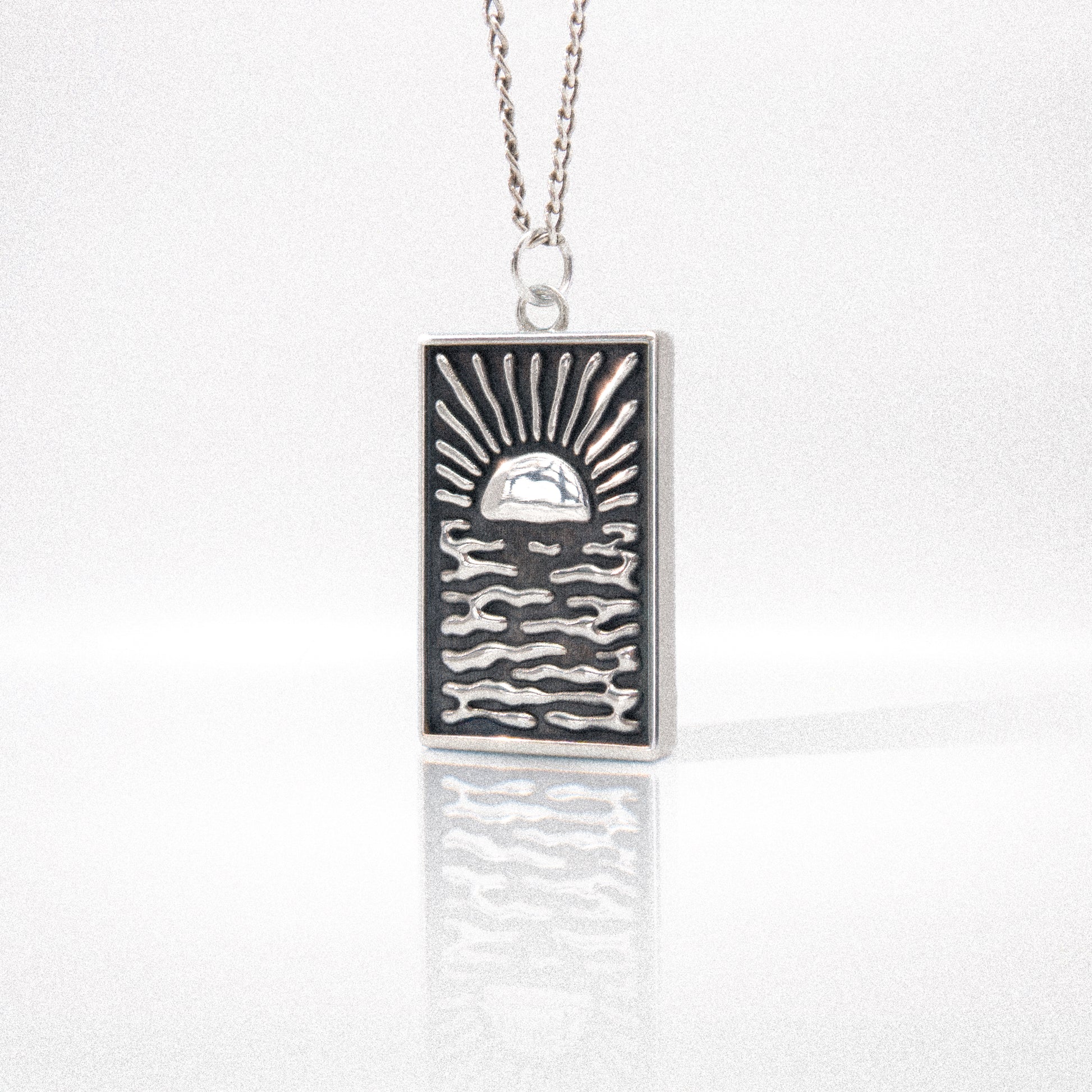 Solaque Echoes of Dusk handmade sterling silver pendant jewellery on white background