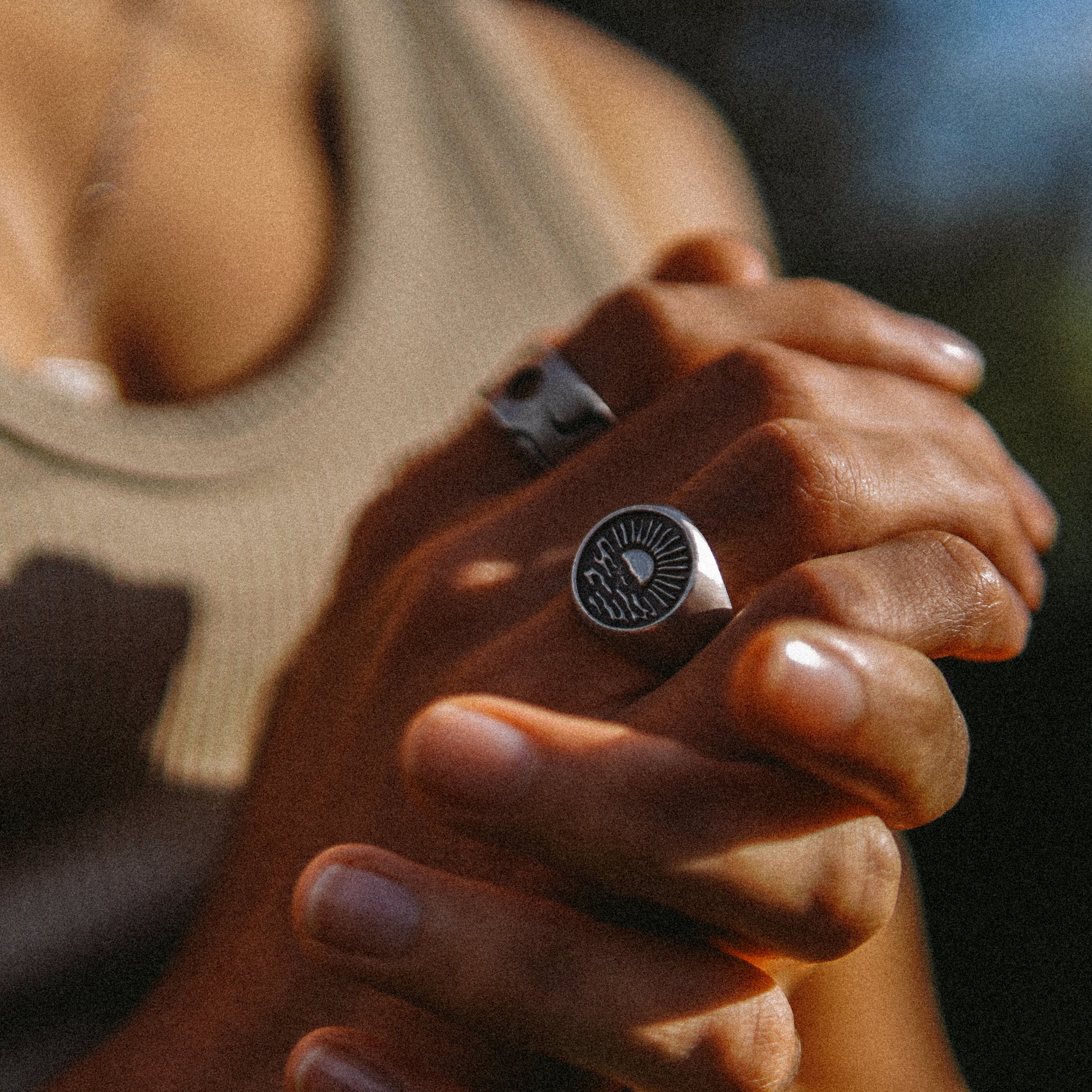 Solaque Echoes of Dusk handmade sterling silver ring jewellery clenching hands
