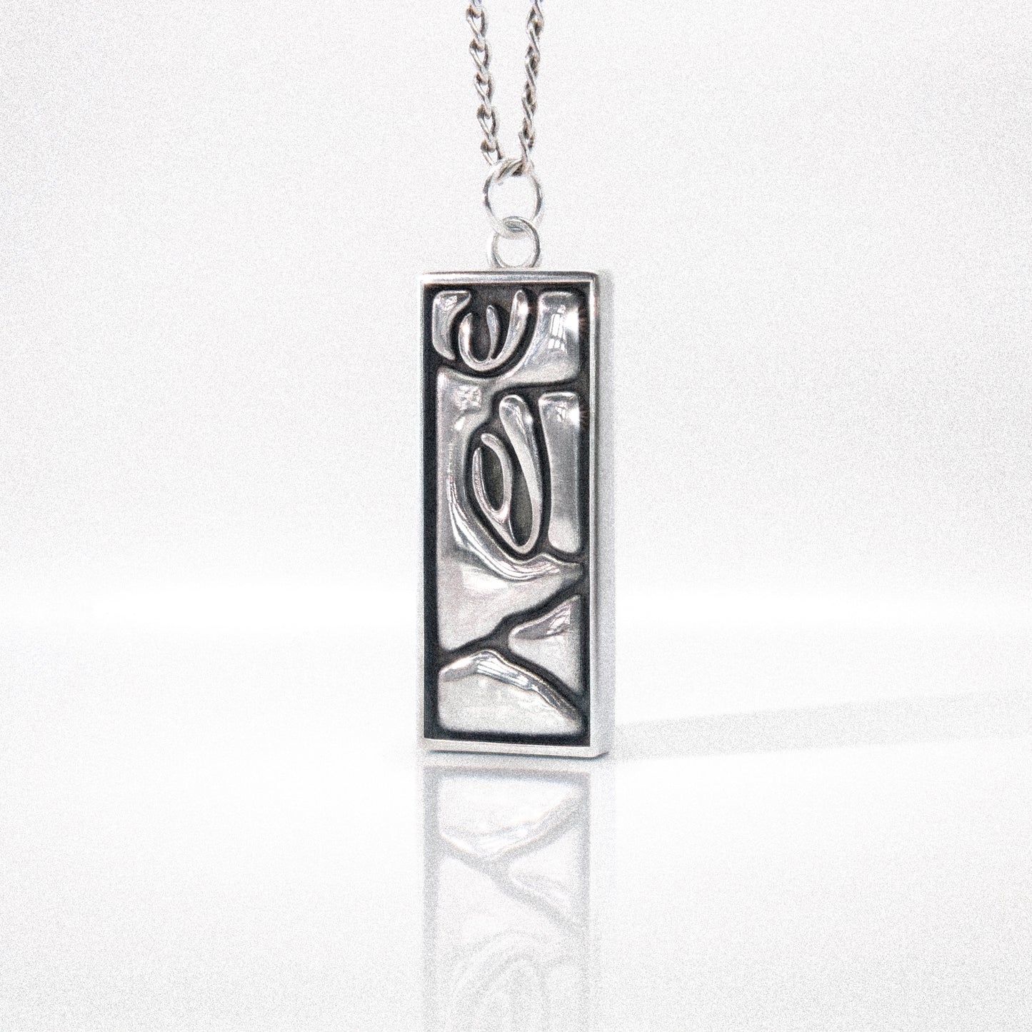 Solaque Silent Gaze handmade sterling silver pendant jewellery on white background