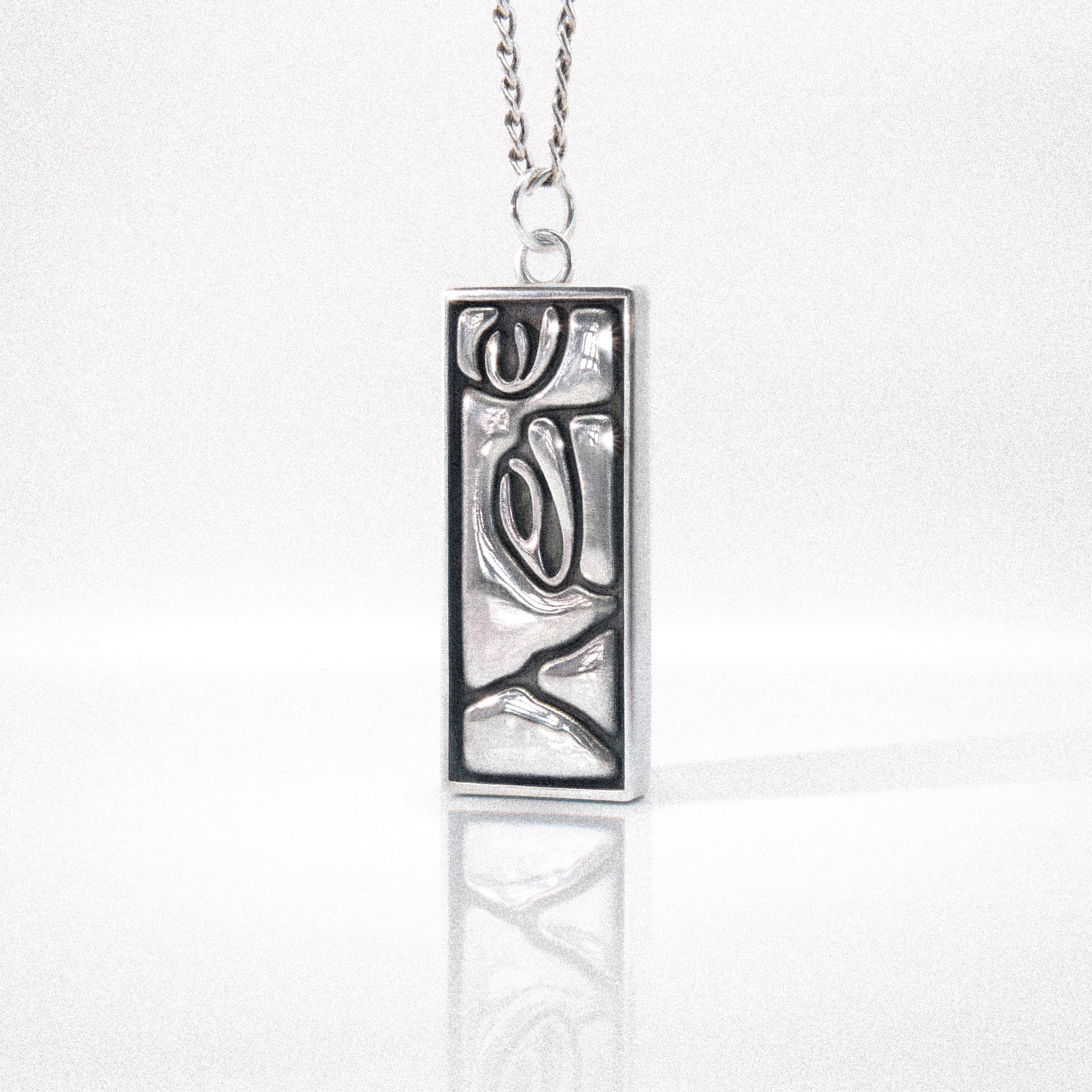 Solaque Silent Gaze handmade sterling silver pendant jewellery on white background