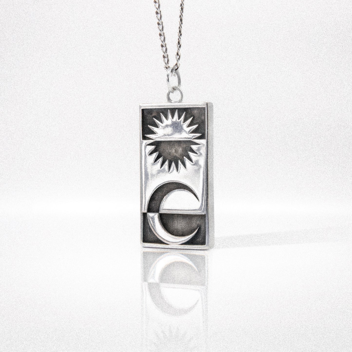Solaque Solar Mirage handmade sterling silver pendant jewellery against white background