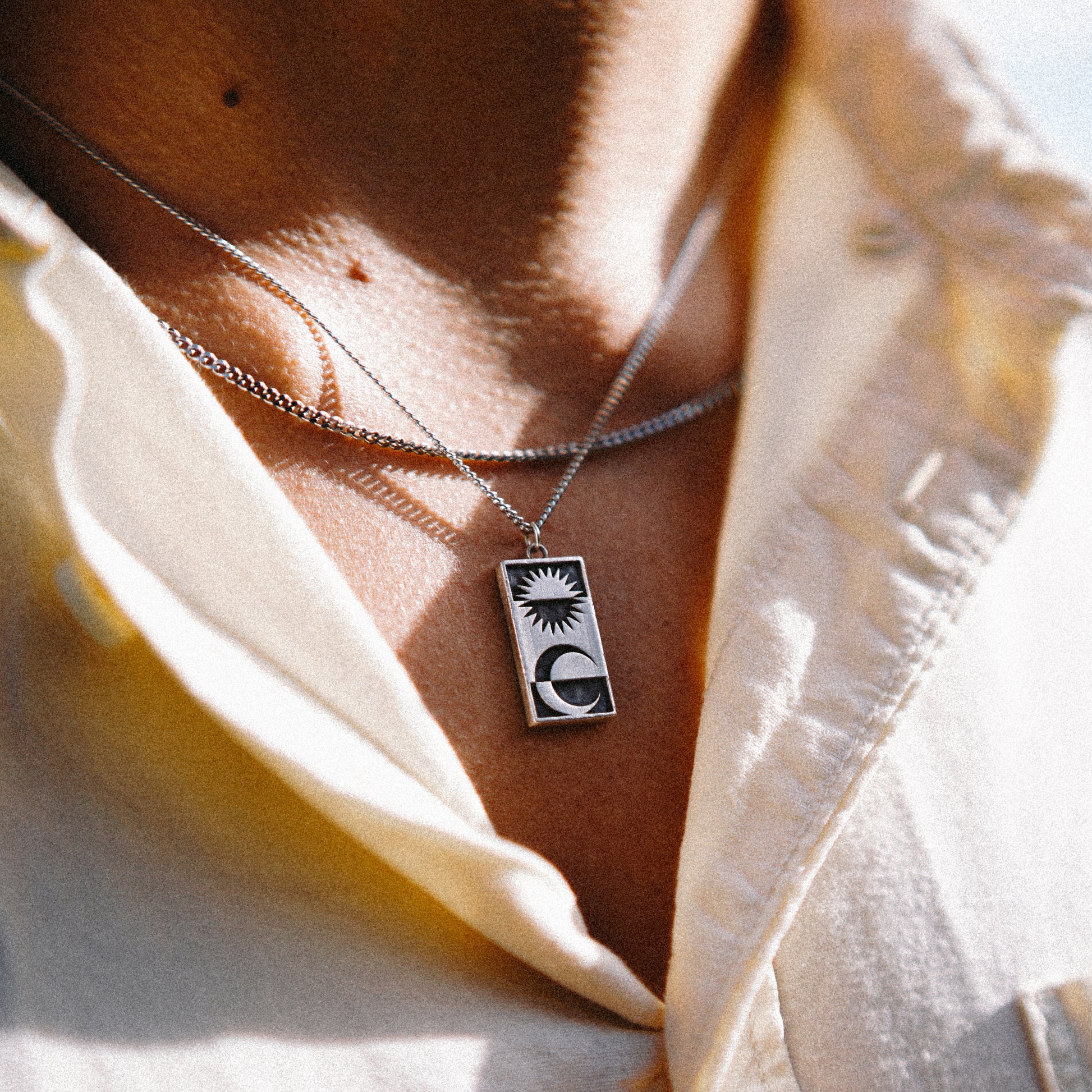 Solaque Solar Mirage handmade sterling silver pendant jewellery wearing around neck