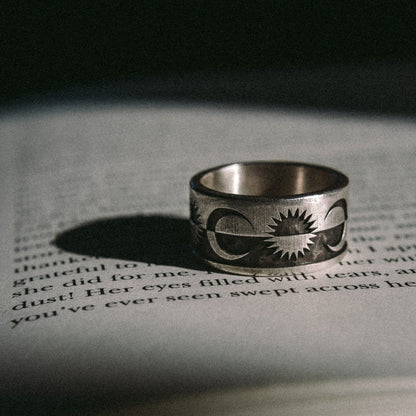 Solaque Solar Mirage handmade sterling silver ring jewellery on book