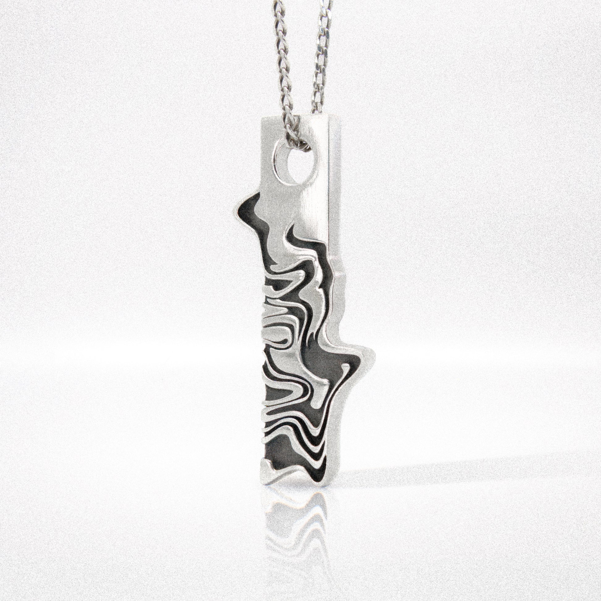 Solaque Tidal Motion handmade sterling silver pendant jewellery on white background