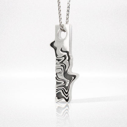 Solaque Tidal Motion handmade sterling silver pendant jewellery on white background