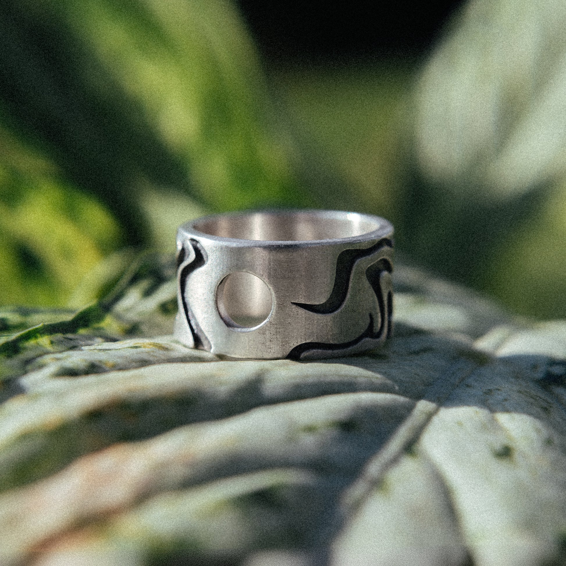 Solaque Tidal Motion handmade sterling silver ring jewellery on leaf