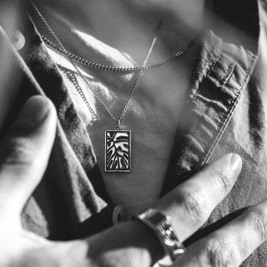 Solaque Veins of Monstera handmade sterling silver leaf design pendant jewellery worn by a person