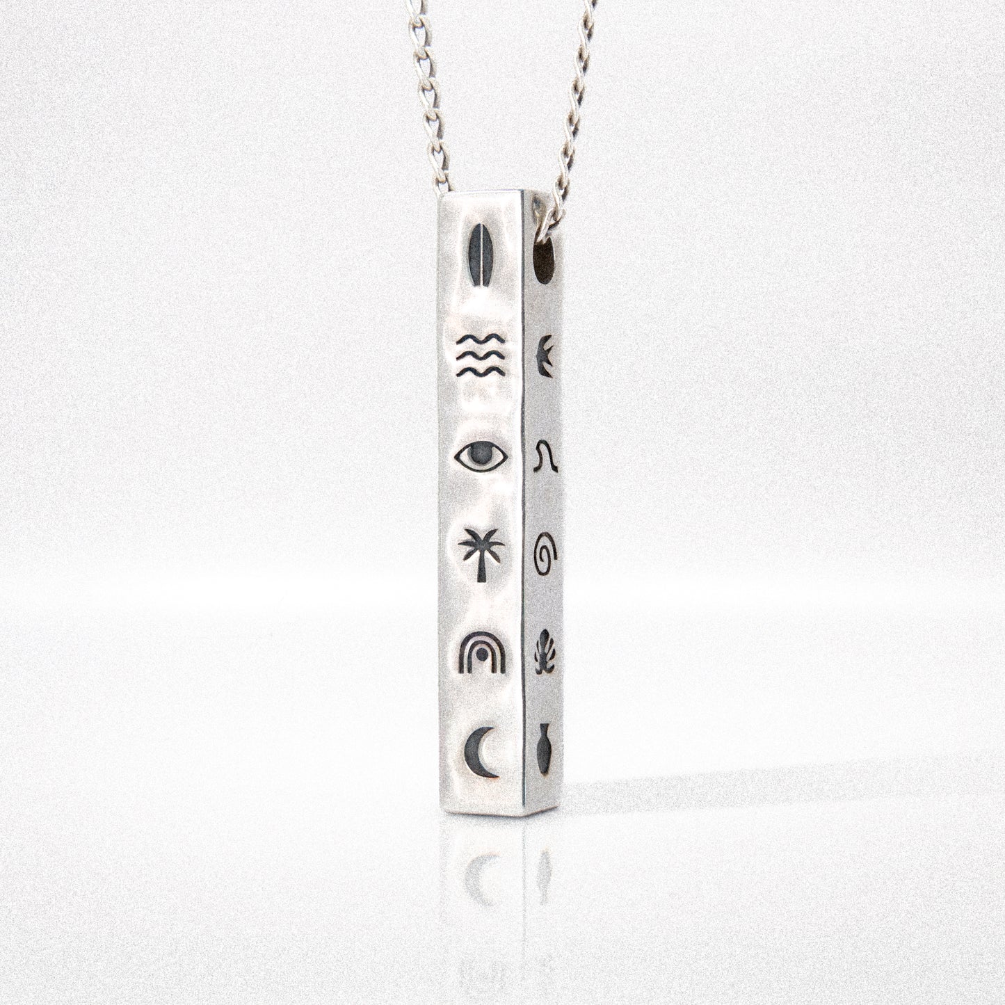 Solaque Wanderer's Script handmade sterling silver pendant jewellery on white background