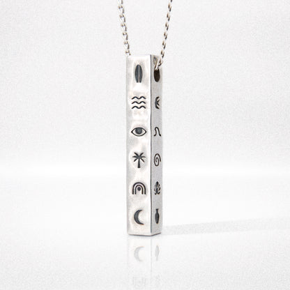 Solaque Wanderer's Script handmade sterling silver pendant jewellery on white background