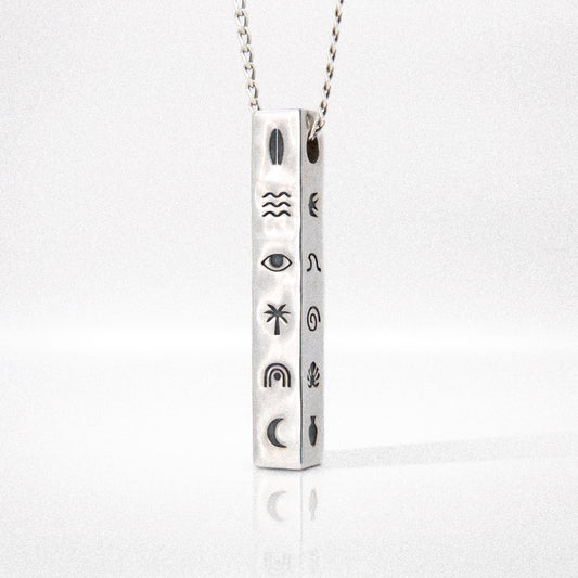 Solaque Wanderer's Script handmade sterling silver pendant jewellery on white background