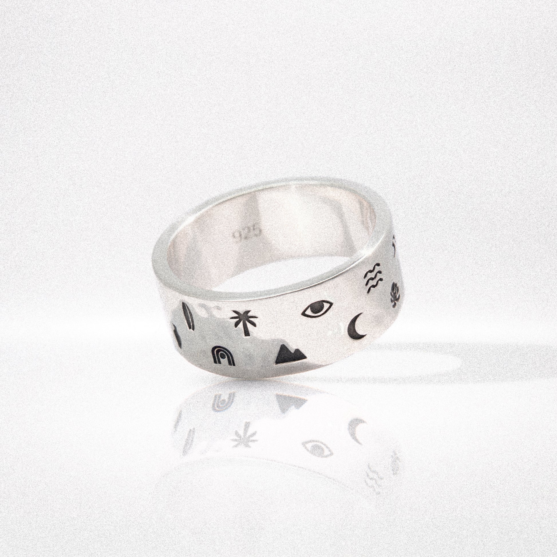 Solaque Wanderer's Script handmade sterling silver ring jewellery on white background